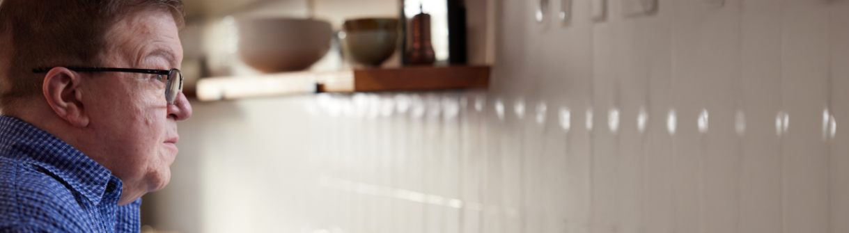 Jason, living with Hunter syndrome, looking into the distance