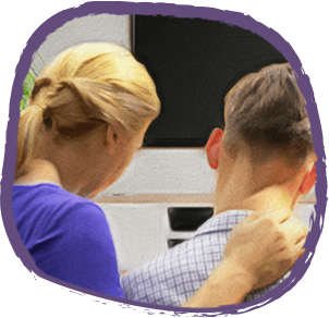 Mother supporting son with school work 